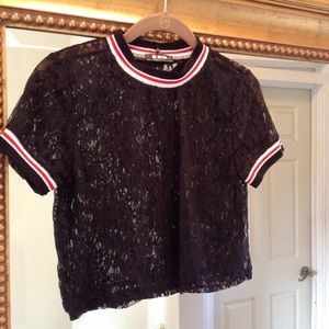 Black lace crop top. White, red trim. Crop top